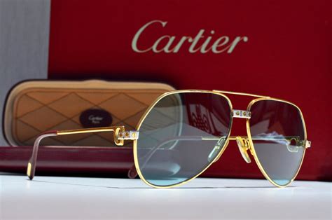 occhiali da sole cerchiati santos cartier prezzo|Santos de Cartier.